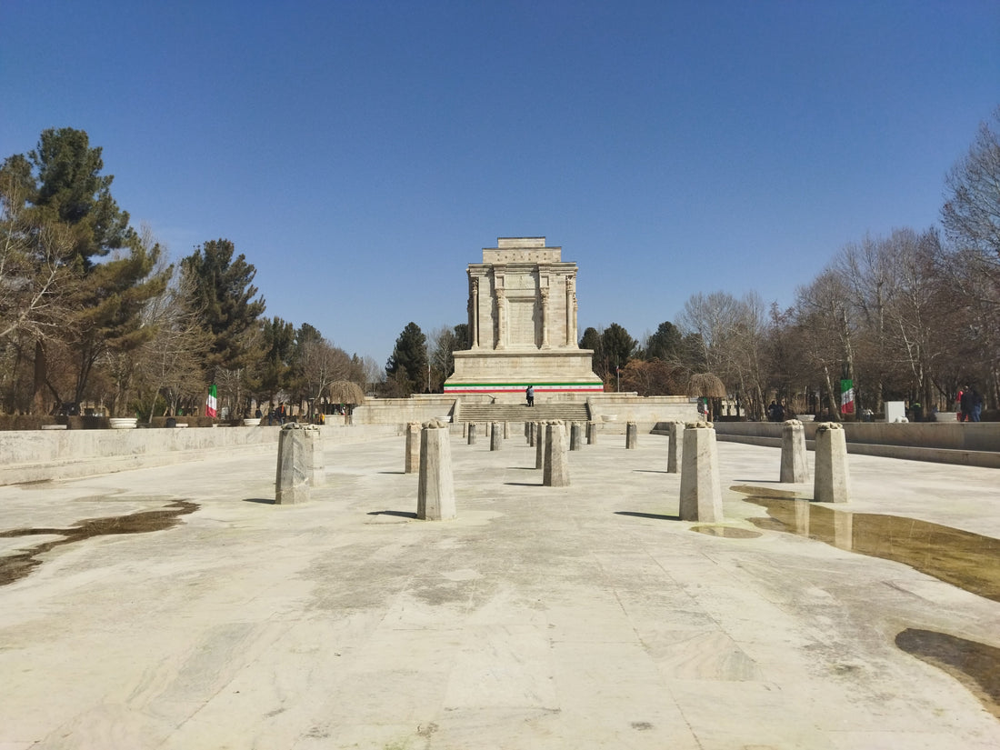Ferdowsi's white marble mausoleum in Tus, Iran, with its stepped base and Achaemenid-inspired details