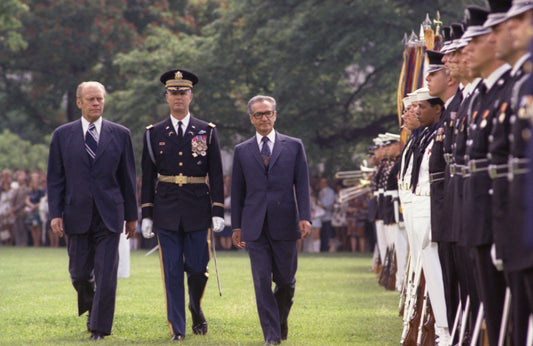 Mohammad Reza Shah Pahlavi and U.S. President Gerald Ford reviewing troops on the White House South Lawn in Washington, D.C., May 15, 1975