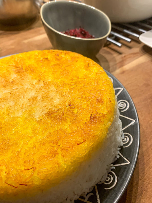 Golden saffron tahdig, the crisp rice crust from the bottom of a Persian rice pot